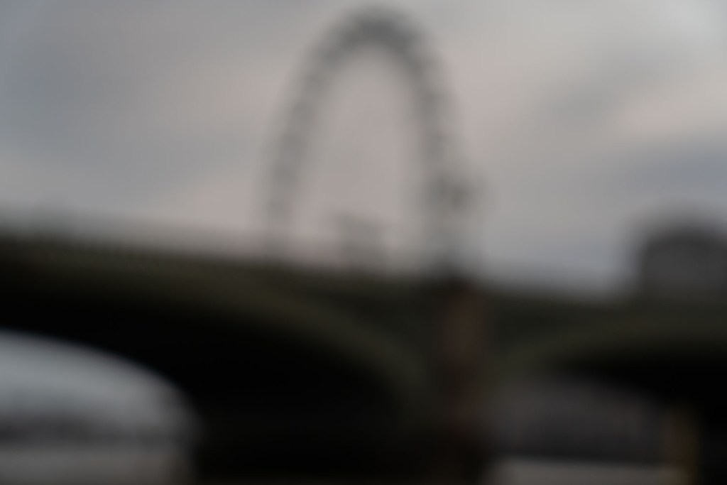 A blurry photo of the London Eye