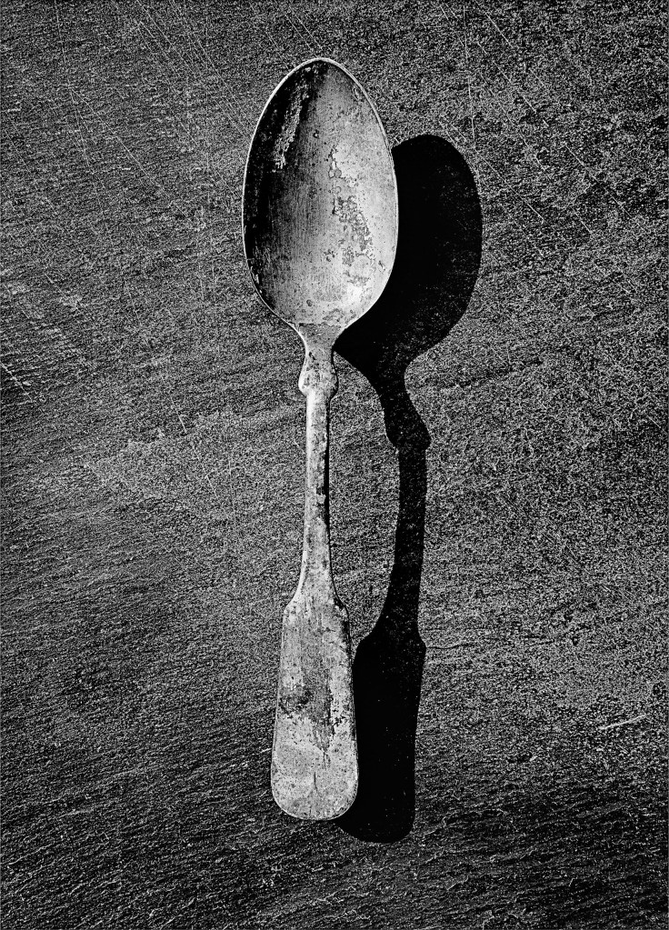 black and white photo of a spoon