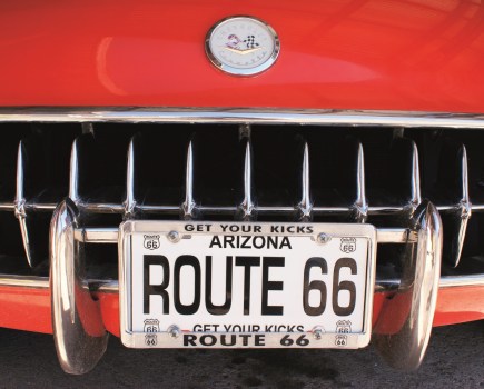 The front grille of a classic red 1957 Chevrolet Corvette
