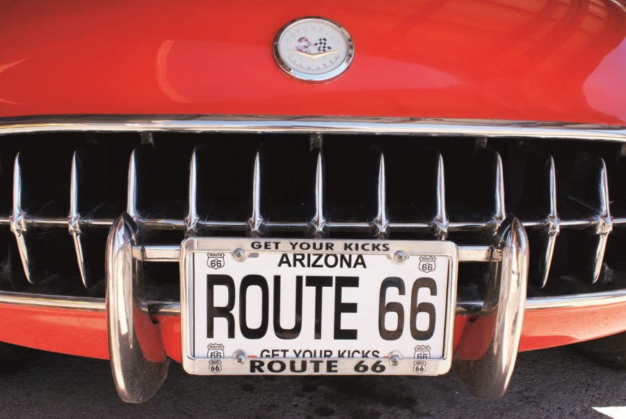The front grille of a classic red 1957 Chevrolet Corvette
