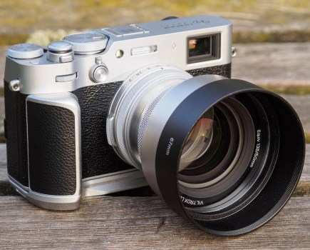 Viltrox TCL-X100VI with hood on Fujifilm X100VI with Neewer handgrip
