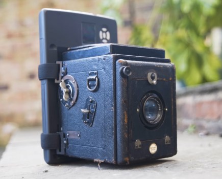 Graindead's 100 year old camera with Flip Pal digital scanner attached. Image: Graindead/YouTube