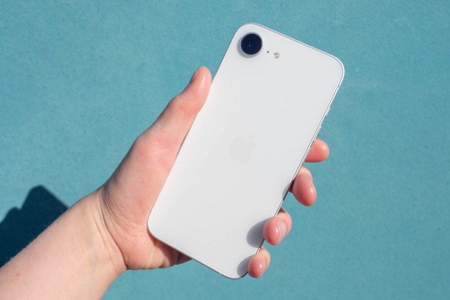 An iPhone 17e in front of a turquoise background