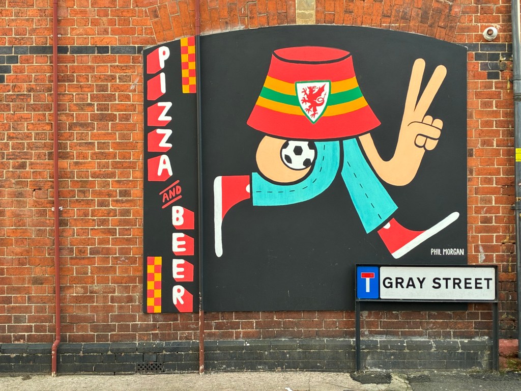 A sample image taken with the iPhone 17e showing a wall mural