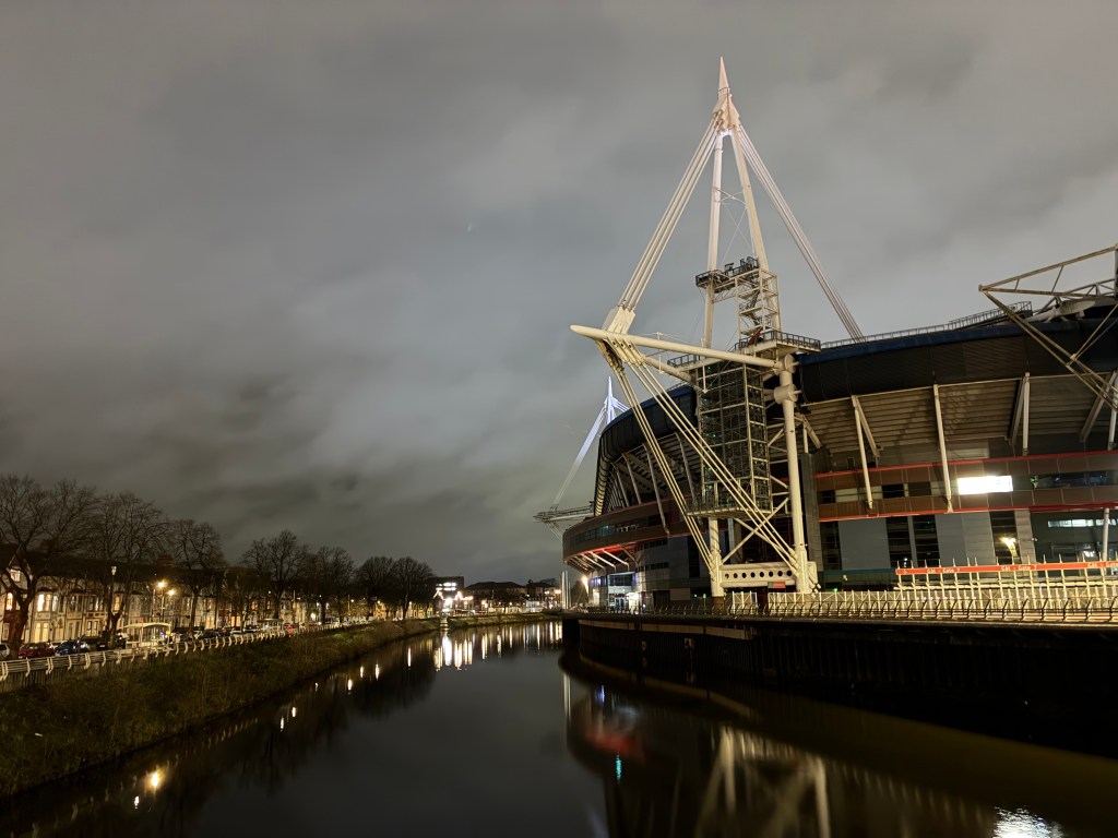 A sample image taken with the iPhone 17e showing a stadium shot after dark