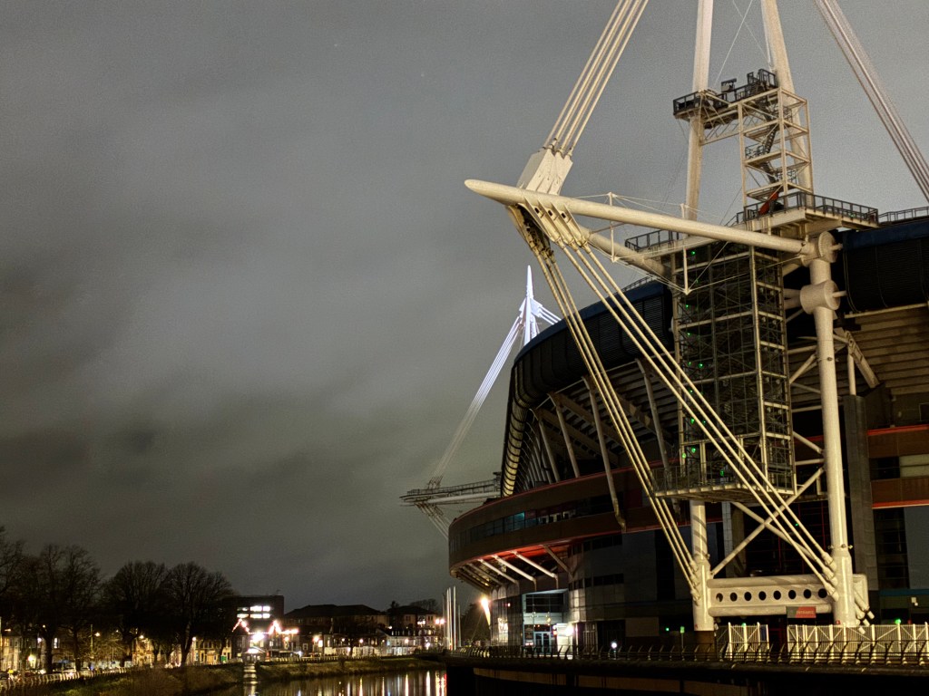 A sample image taken with the iPhone 17e showing a stadium shot after dark