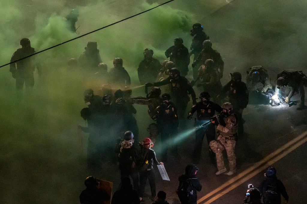 Officers from the Department of Homeland Security and other federal agencies clash with demonstrators outside an ICE processing center. The intense summer protests centered on opposing the administration’s escalating mass-deportation agenda. Portland, Oregon, United States, 24 June 2025.