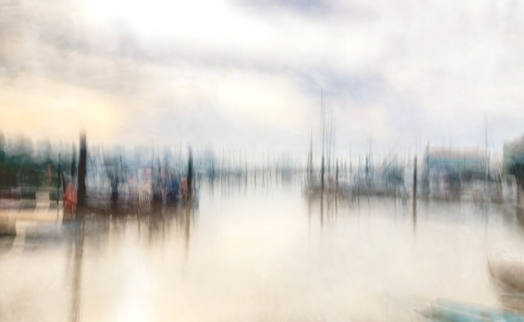 boat harbour landscape with intentional camera movement blurring the scene