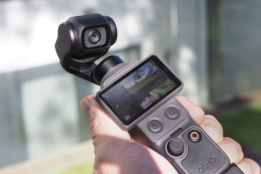 DJI Osmo Pocket 4 in hand