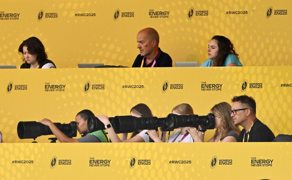 Nikon Ambassador Laurence Griffiths (bottom right) on hand to advise NTU students covering the women's rugby. Image Credit: Getty Images