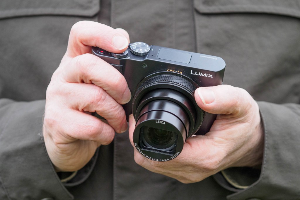 Panasonic Lumix TZ300 in-hand. 
