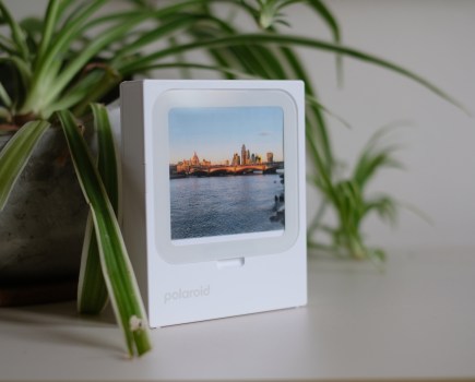Photograph of Polaroid Hi-Print 3x3 printer displaying a printed photo