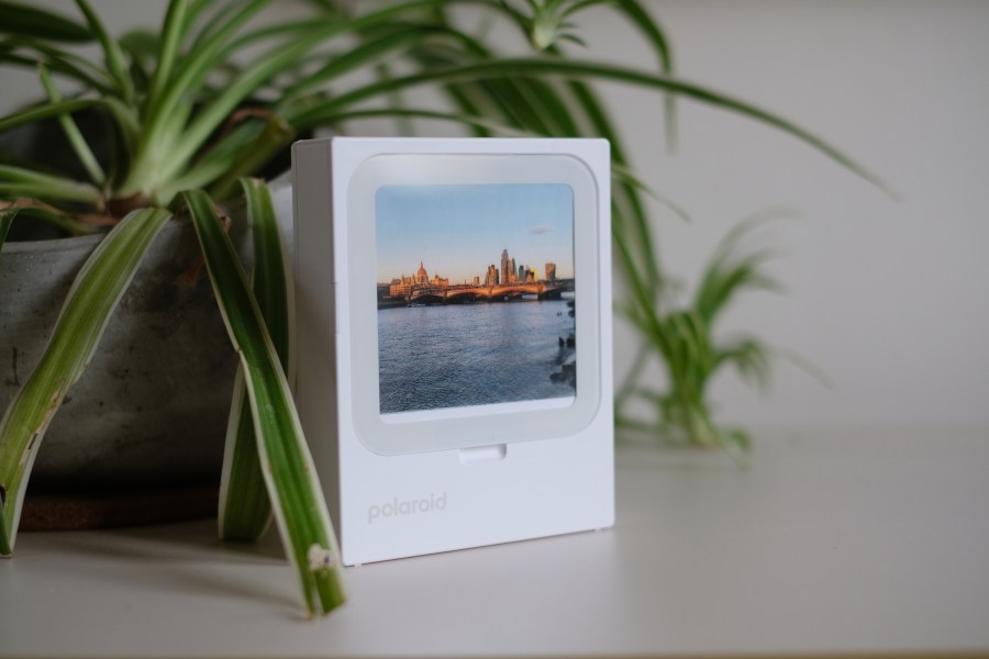 Photograph of Polaroid Hi-Print 3x3 printer displaying a printed photo