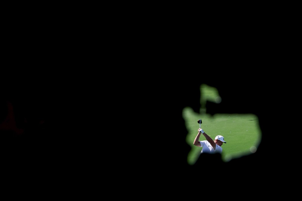 AUGUSTA, GEORGIA - APRIL 08: Bryson DeChambeau of the United States plays a shot on the driving range during a practice round prior to the 2025 Masters Tournament at Augusta National Golf Club on April 08, 2025 in Augusta, Georgia. (Photo by Richard Heathcote/Getty Images)