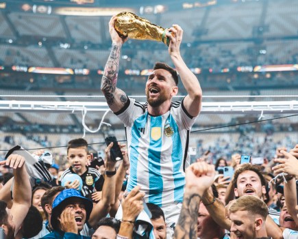 Image of Messi lifting the world cup