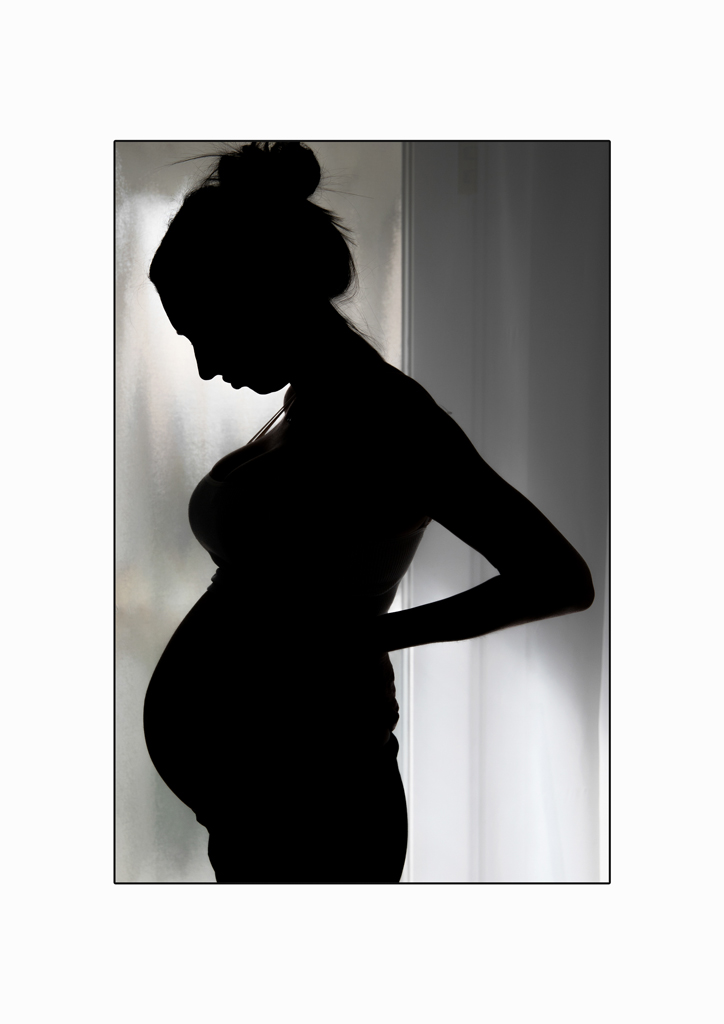 silhoette of a pregnant woman side profile