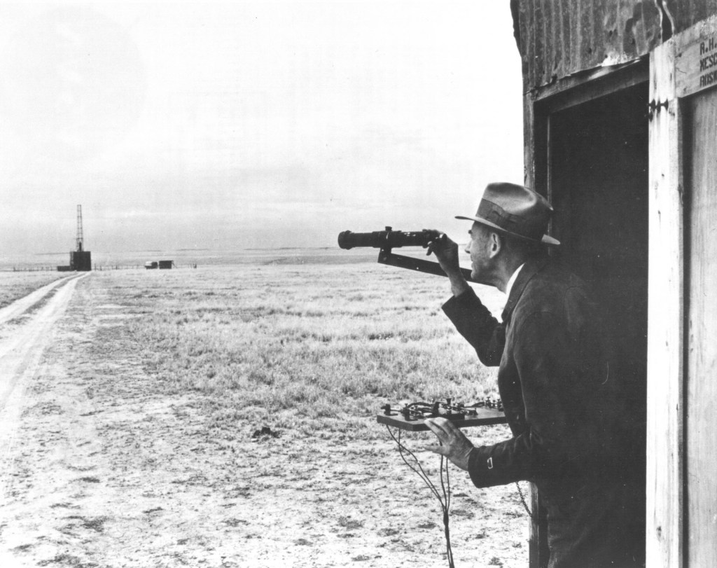 Launching of rockets in New Mexico, USA, 1940: Robert Hutchings Goddard observing - Dr. Goddard Observes Launch Site
