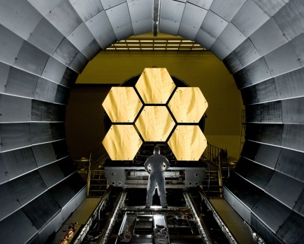 James Webb Space Telescope. NASA engineer Ernie Wright looks on as the first six flight-ready primary mirror segments are prepped to begin final cryogenic testing at NASA's Marshall Space Flight Center in 2011. This represents the first six of 18 segments that will form NASA's James Webb Space Telescope’s primary mirror for space observations