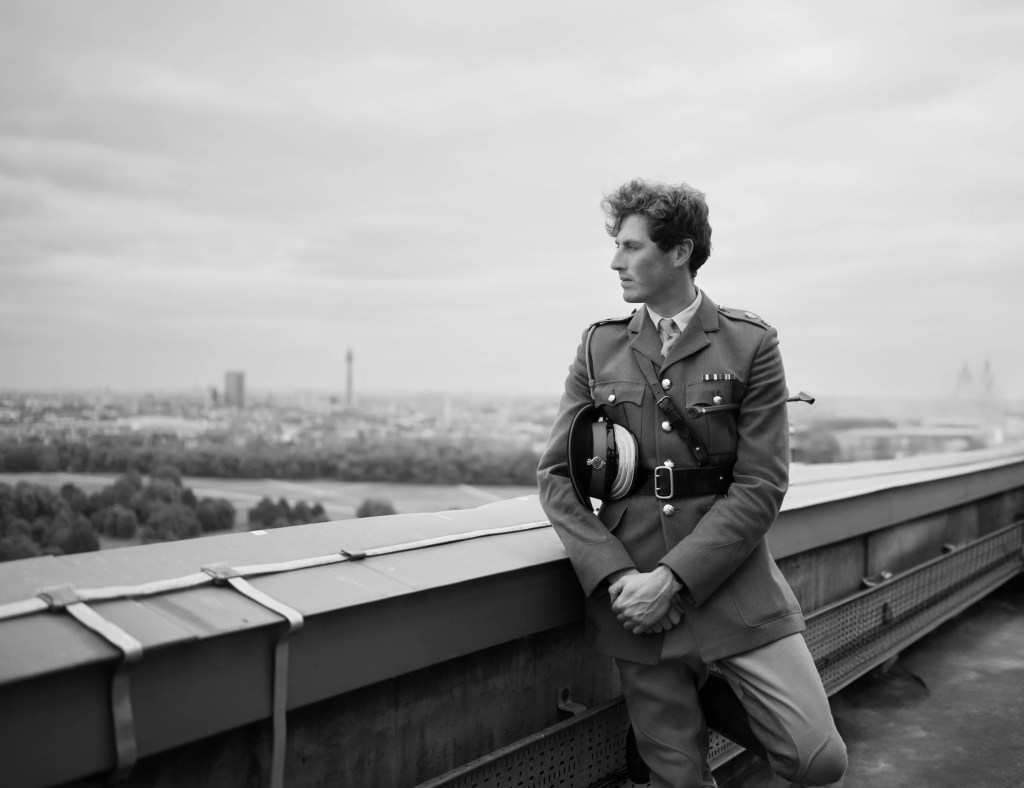 black and white portrait of a man in military uniform
