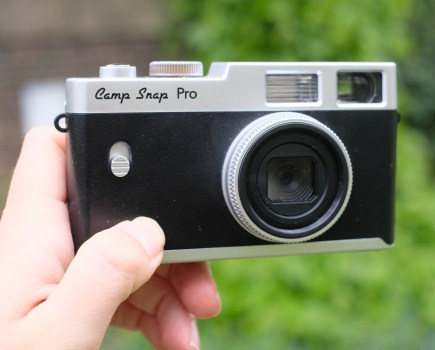 Photograph of the Camp Snap CS-PRO digital compact camera in hand facing front