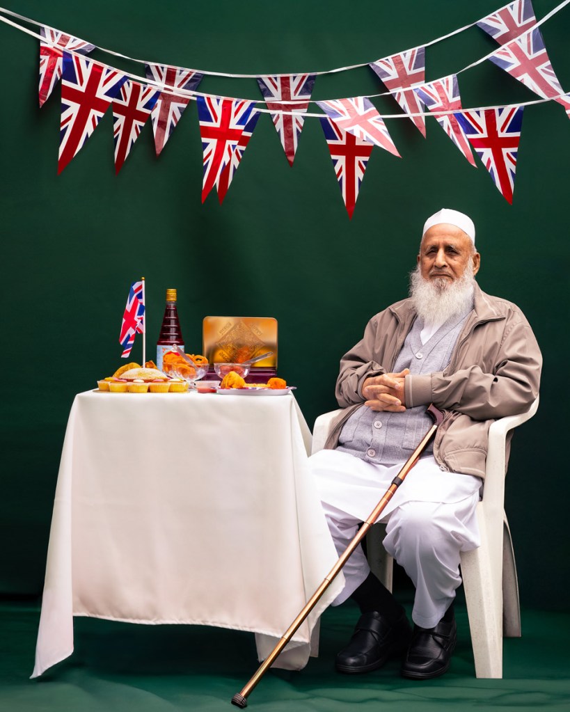 man sat at table with cherru bakewell, angel slices and gulab jamun