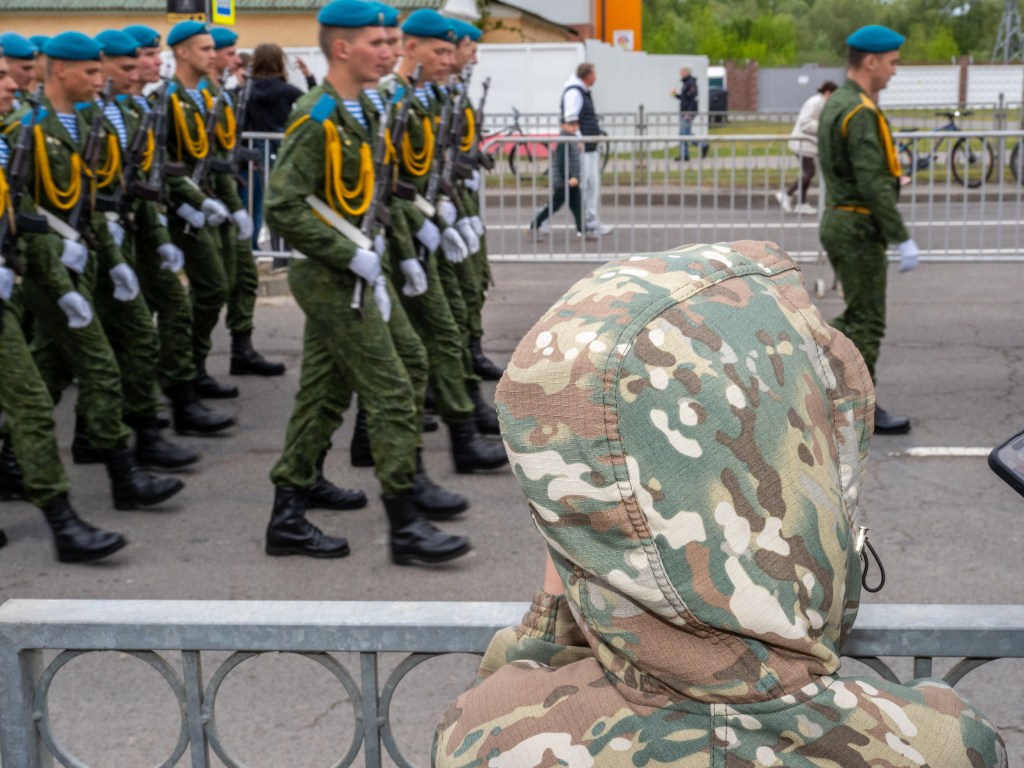 BREST, BELARUS - MAY 9, 2026: Marching on to war? What direction is Belarus is heading in, and what sort of future do young people marching through Brest face. Image Credit: Peter Dench