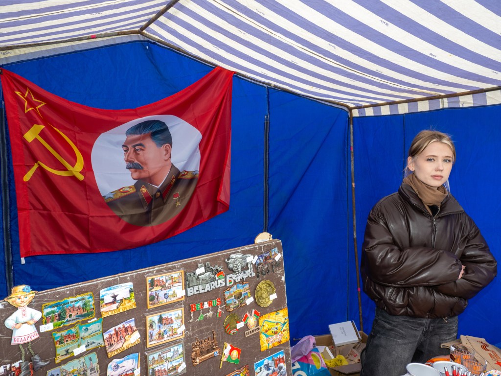 BREST, BELARUS - MAY 9, 2026: Souvenirs for sale near the memorial complex of the Brest Fortress during Victory Day commemorations including a flag featuring Joseph Stalin who led the Soviet Union's defeat of Nazi Germany in 1945. Image Credit: Peter Dench
