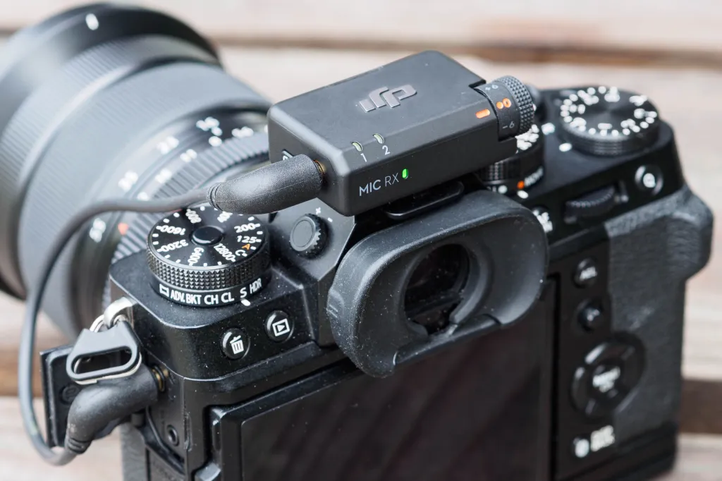 DJI Mic Mini receiver plugged into a camera.