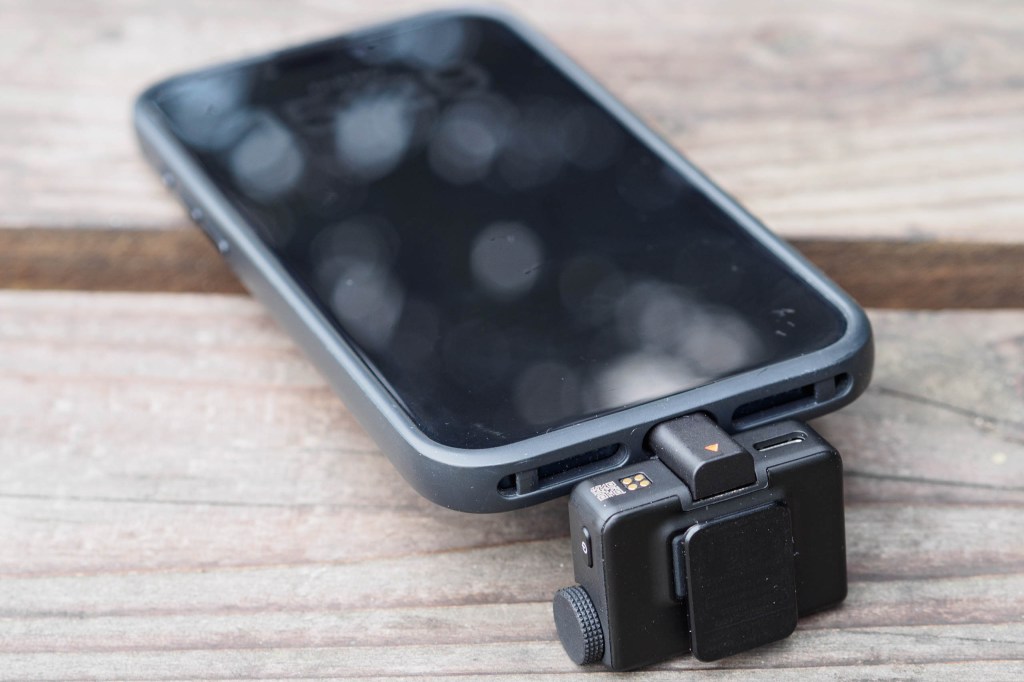 DJI Mic Mini receiver plugged into a smartphone