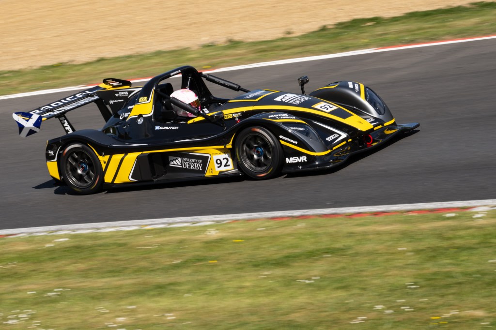 Sony A7R VI motor racing panning sample image.