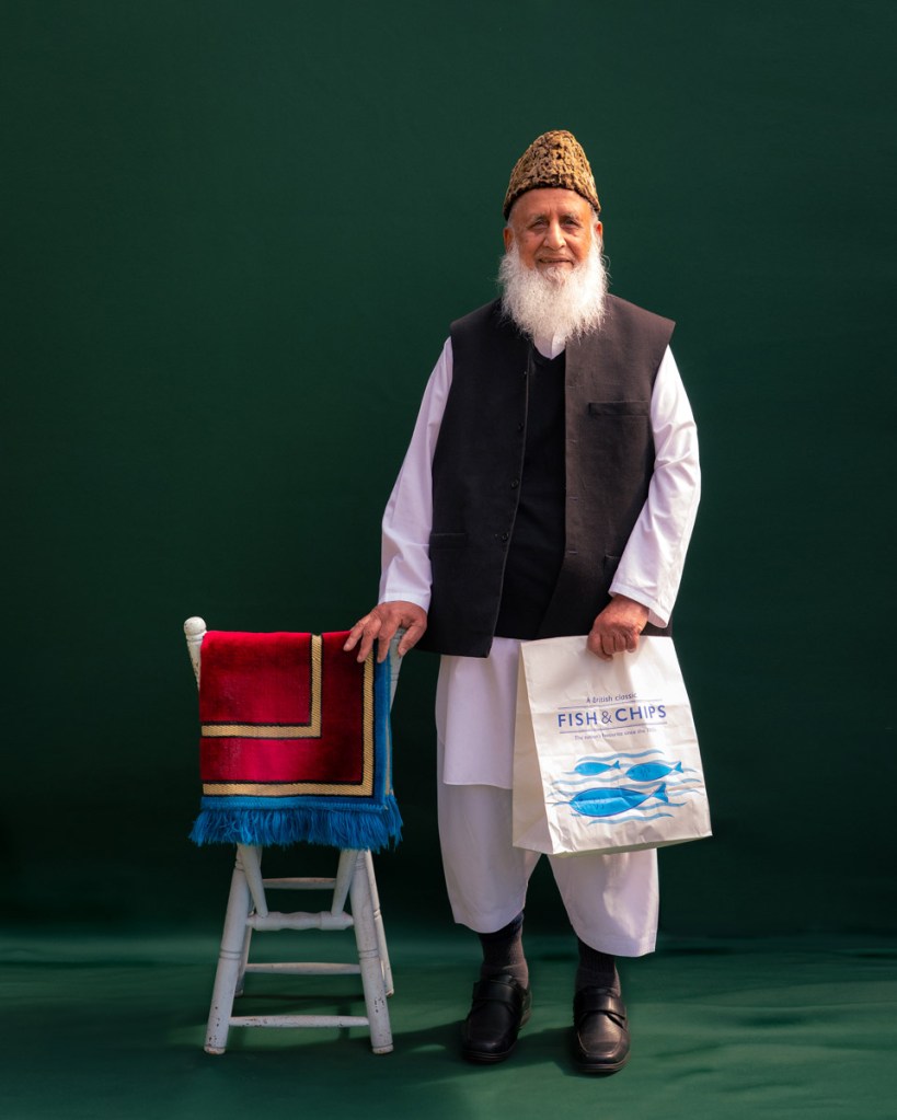 Ghulam Abbas stood with fish and chip bag