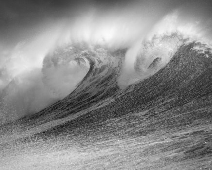 black and white photo of two big waves