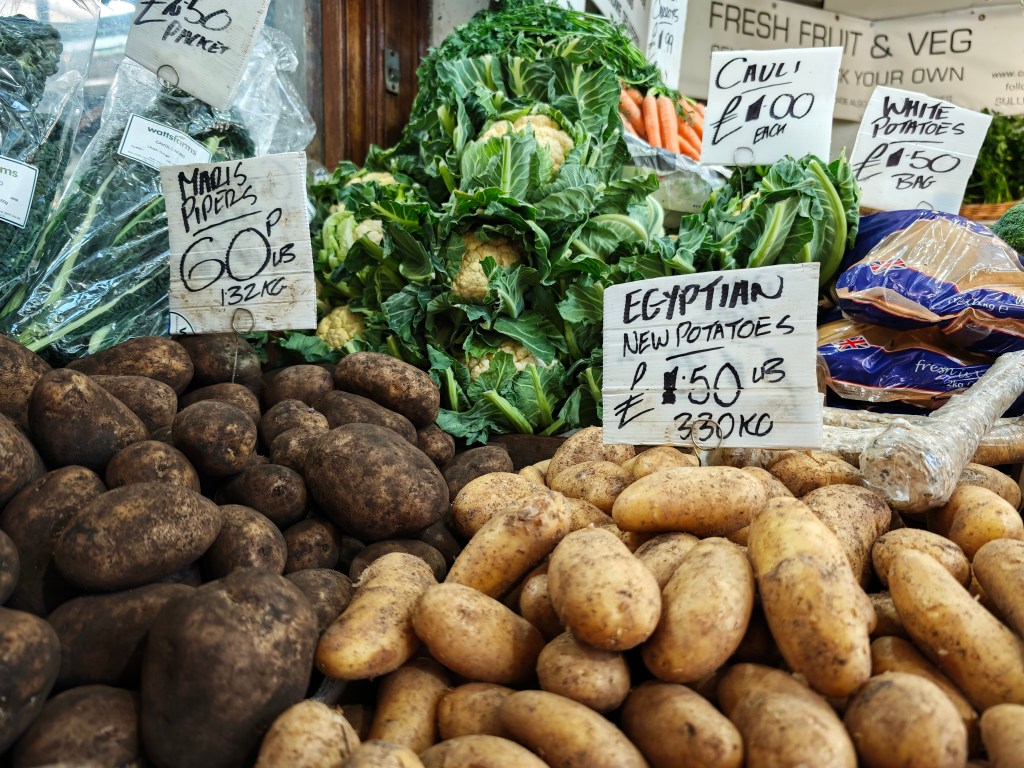 Some vegetables on a market stall