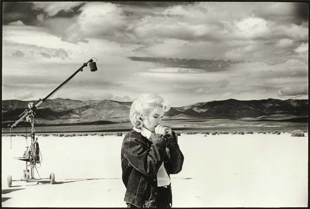 Marilyn Monroe going over lines for a difficult scene she is about to play with Clark Gable in the Nevada desert for The Misfits, 1960. © The Estate of Eve Arnold 