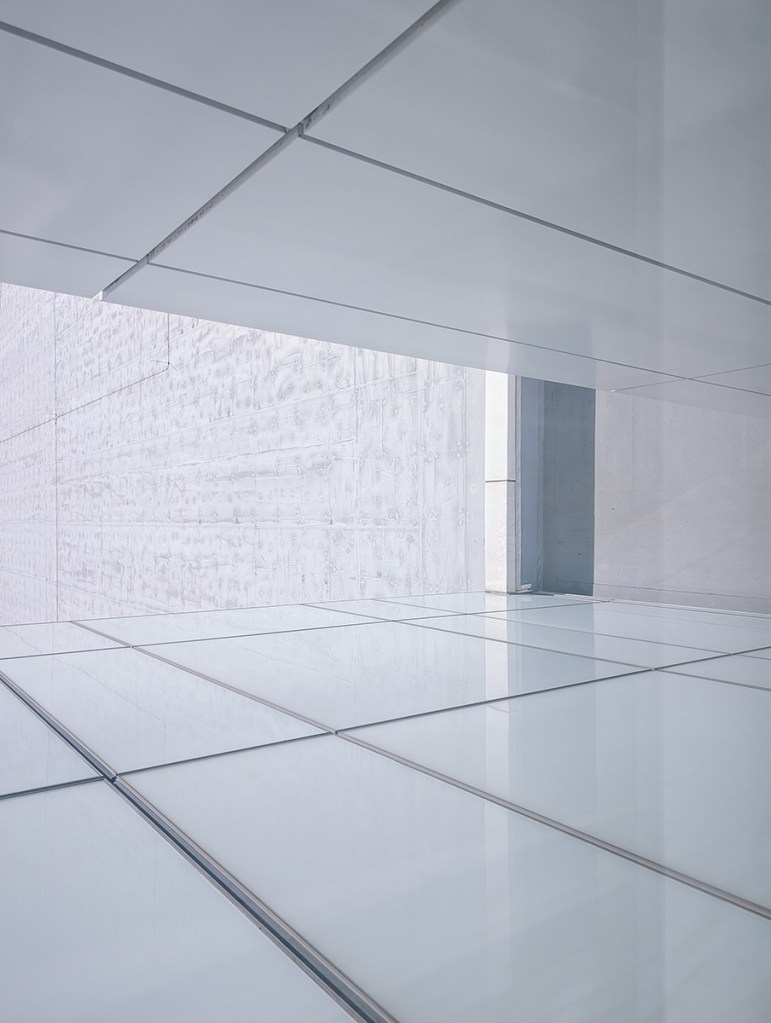 architecture photo of white building with lines
