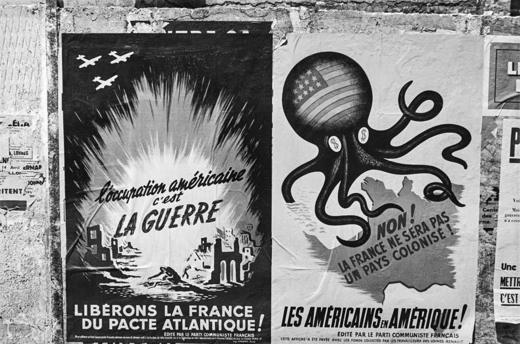 JOHN BAER The Extraordinary Ordinary: A Memoir in Photographs 1945-1954. John Baer, Anti-American Posters, Montpellier, 1951, from JOHN BAER The Extraordinary Ordinary: A Memoir in Photographs 1945-1954.