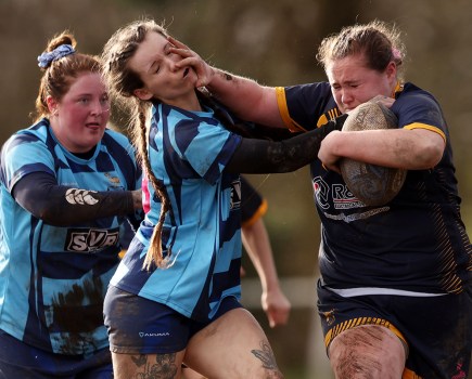women playing rugby