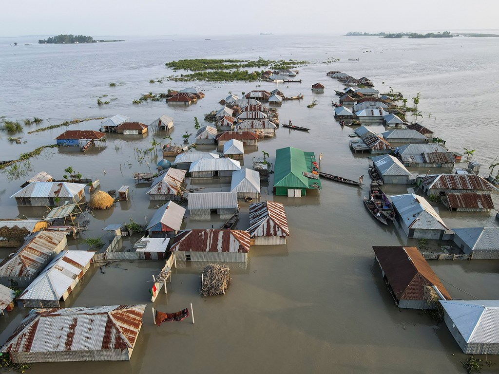 An aerial view shows an entire village partially submerged during severe flooding in Jatrapur Union, Kurigram district, Bangladesh, on June 22, 2022.