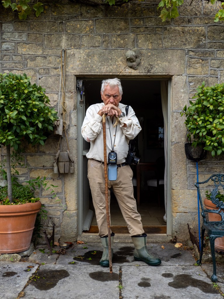 British photojournalist Sir Don McCullin outside the front door of his home in Somerset on July 22, 2022 in Somerset, England. Photo by Peter Dench/Getty Images