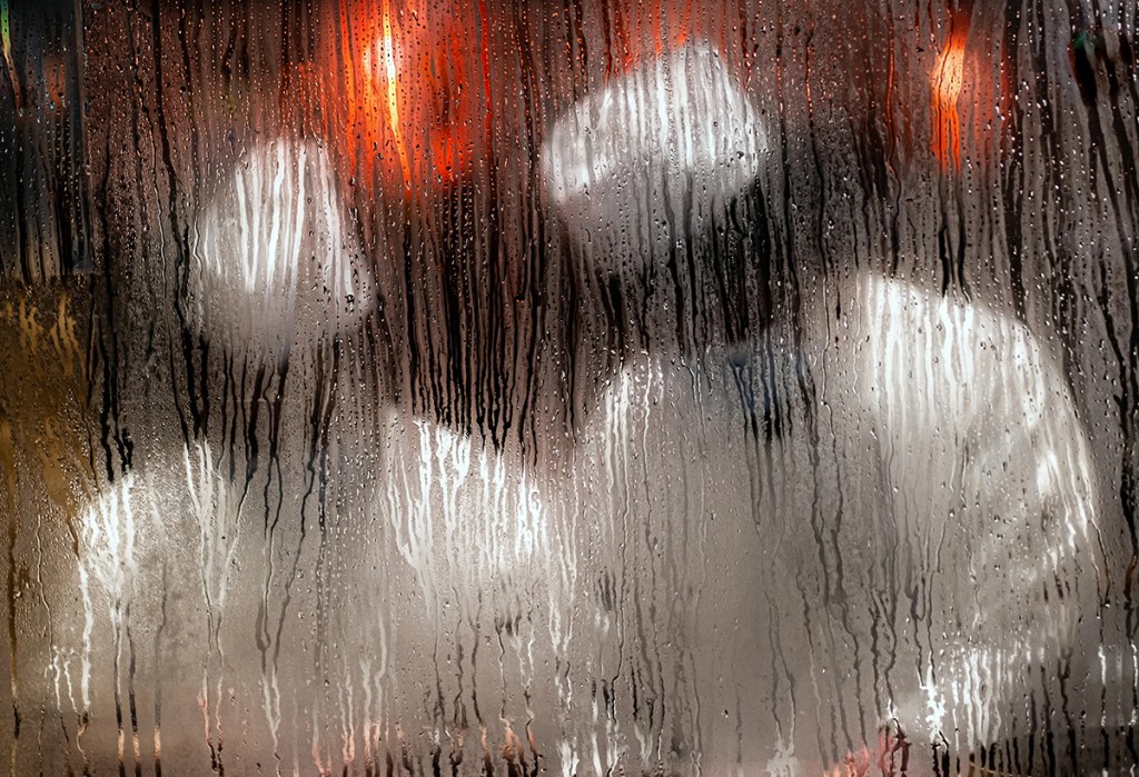 two people through a steamed up window