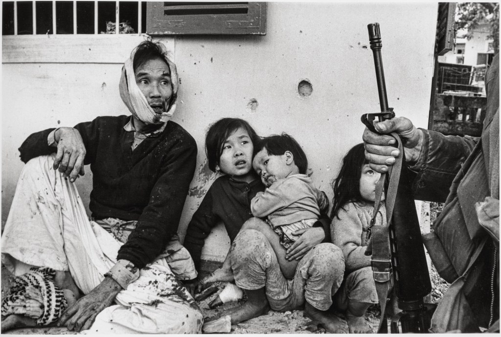 “This family was in a bunker. When the Americans threw a grenade in a bunker, they would shout ‘fire in the
hole!’ before there was an enormous explosion. I don’t know how these people got out alive. I was just trying
to show how you’d feel if that was your family—so badly shocked and threatened at the end of it all” © Don McCullin