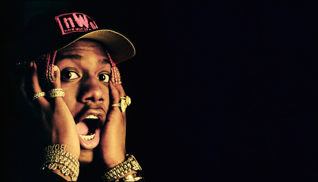 Lil Yachty wearing a customized Rolex Day-Date in 18k yellow gold