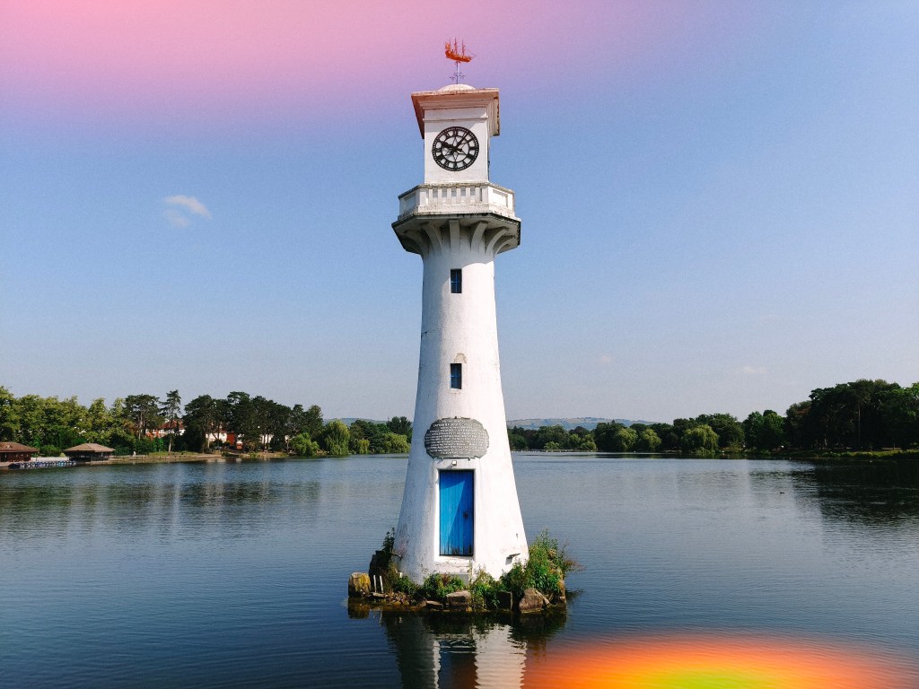 Oppo Reno 16 light leak effect, lighthouse on a lake