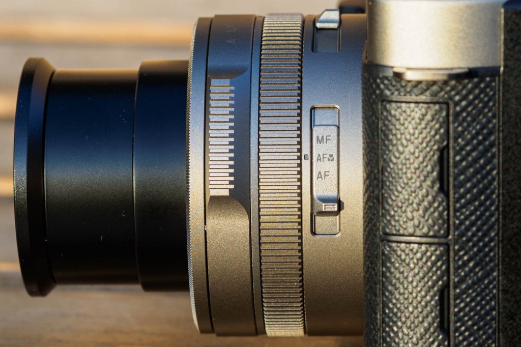 Panasonic Lumix L10 focus mode switch. 