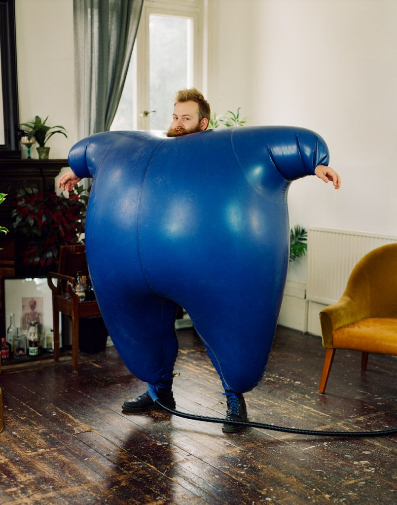 Robert Coxwell, Tom in his inflatable (and inflated) latex body suit, Hackney. From the series Flowers © Robert Coxwell. Courtesy of The Royal Photographic Society