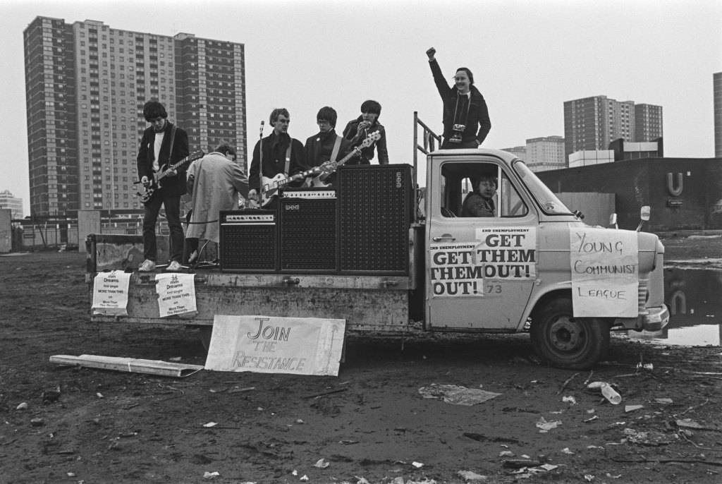 six men on top of a lorry protest