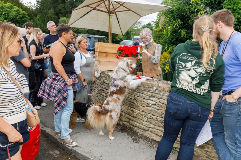 Scarecrow Festival, Lacock, Wiltshire, England, 2025. 
Image Credit: Martin Parr/Magnum Photos