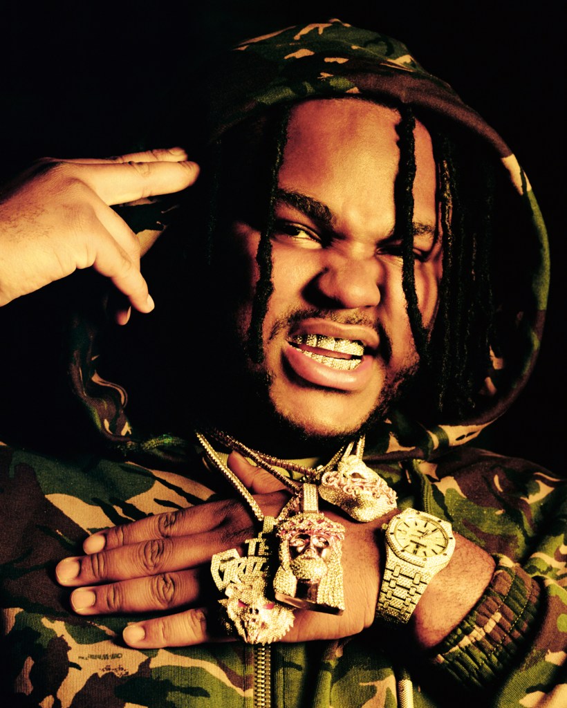 Tee Grizzley with multiple icy accessories