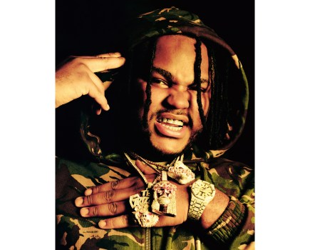 Tee Grizzley with multiple icy accessories