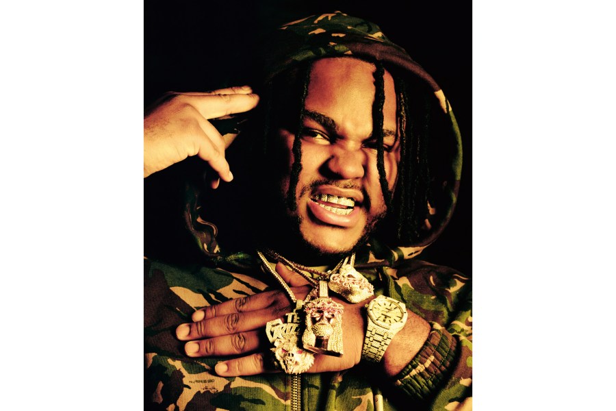 Tee Grizzley with multiple icy accessories